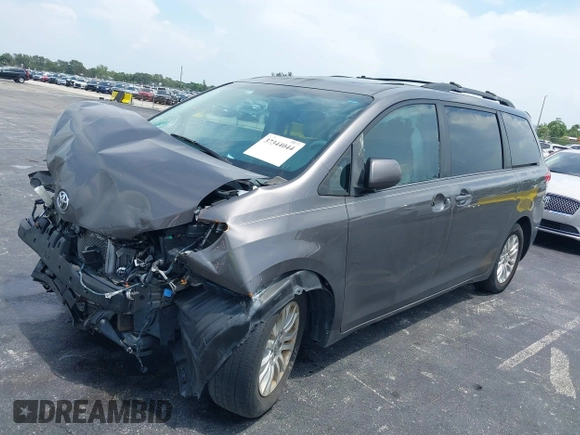 2012 Toyota Sienna XLE AAS с VIN 5TDYK3DC5CS244182, выставлен на аукционе IAAI как лот 42010398 с пробегом 218 607 миль миль и . История ставок и продаж доступна на DreamBid. Изображение 2.