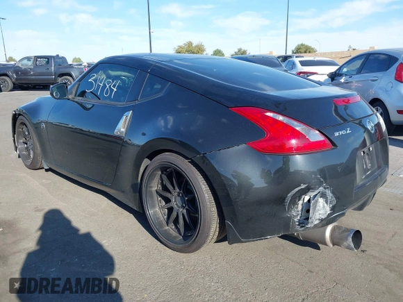 2016 Nissan 370Z with VIN JN1AZ4EH1GM933265, listed as a IAAI auction lot 41831484 with 98,193 mi miles. Bid and sale history available at carsss.com. Image 3.