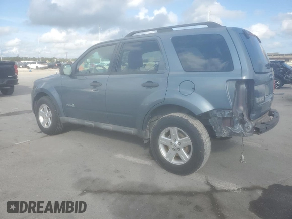 2011 Ford Escape Hybrid with VIN 1FMCU5K37BKC69587, listed as a Copart auction lot 68494964 with 126,353 mi miles and Salvage title. Bid and sale history available at DreamBid. Image 2.