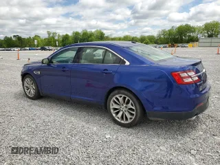 2015 Ford Taurus Limited with VIN 1FAHP2J85FG133521, listed as a Copart auction lot 57411685 with 140,535 mi miles and Salvage title. Bid and sale history available at DreamBid. Image 2.