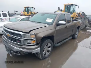 2014 Chevrolet Silverado 1500 LTZ with VIN 1GCVKSEC5EZ249444, listed as a IAAI auction lot 41904569 with 123,650 mi miles and . Bid and sale history available at DreamBid. Image 19.