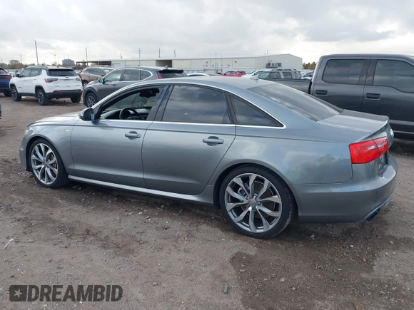 2013 Audi A6 3.0T Prestige with VIN WAUHGAFC3DN131239, listed as a IAAI auction lot 41168869 with 134,628 mi miles. Bid and sale history available at carsss.com. Image 13.
