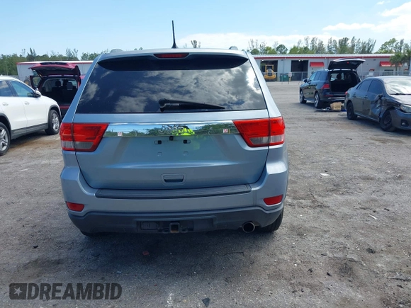 2013 Jeep Grand Cherokee Laredo with VIN 1C4RJEAG2DC517303, listed as a IAAI auction lot 42040405 with 222,952 mi miles. Bid and sale history available at carsss.com. Image 16.