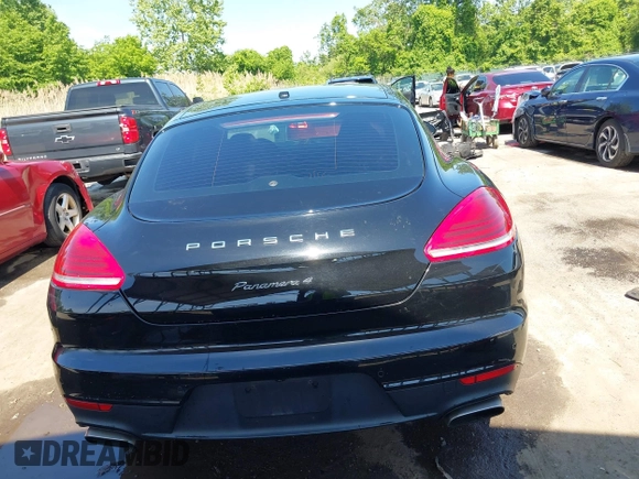 2014 Porsche Panamera z VIN WP0AA2A70EL009084, wystawiony jako IAAI lot #42221798 z przebiegiem 85 853 mil mil oraz . Historia ofert i sprzedaży dostępna na DreamBid. Obrazek 16.