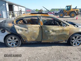 2011 Buick LaCrosse CXL z VIN 1G4GC5ED9BF120552, wystawiony jako IAAI lot #42219711 z przebiegiem Nie podano mil oraz . Historia ofert i sprzedaży dostępna na DreamBid. Obrazek 13.