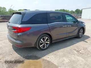 2022 Honda Odyssey Touring z VIN 5FNRL6H83NB023583, wystawiony jako IAAI lot #42425498 z przebiegiem Nie podano mil oraz . Historia ofert i sprzedaży dostępna na DreamBid. Obrazek 4.