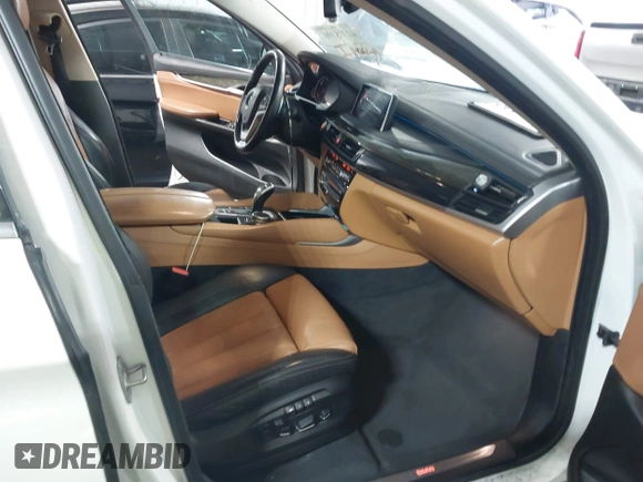 2015 BMW X6 sDrive35i z VIN 5UXKU0C54F0F91660, wystawiony jako IAAI lot #42375390 z przebiegiem 150 209 mil mil oraz . Historia ofert i sprzedaży dostępna na DreamBid. Obrazek 5.