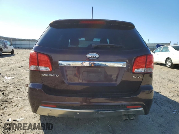 2011 Kia Sorento SX z VIN 5XYKW4A29BG156677, wystawiony jako Copart lot #42731225 z przebiegiem 245 581 mil mil oraz Czysty tytuł • Clean title. Historia ofert i sprzedaży dostępna na DreamBid. Obrazek 6.