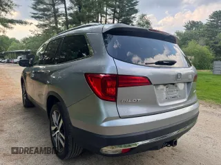 2018 Honda Pilot Touring z VIN 5FNYF6H94JB070661, wystawiony jako Copart lot #60926415 z przebiegiem 205 538 mil mil oraz Czysty tytuł • Clean title. Historia ofert i sprzedaży dostępna na DreamBid. Obrazek 3.