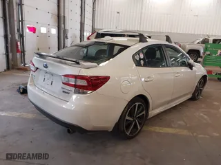 2020 Subaru Impreza Sport with VIN 4S3GKAL69L3612151, listed as a IAAI auction lot 41760734 with 62,768 mi miles. Bid and sale history available at carsss.com. Image 4.