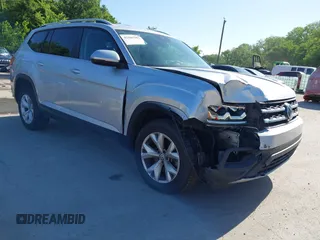 2019 Volkswagen Atlas SE with VIN 1V2UR2CA2KC557449, listed as a IAAI auction lot 42281302 with 106,739 mi miles and . Bid and sale history available at DreamBid. Image 1.