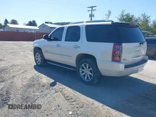 2011 GMC Yukon Denali with VIN 1GKS2EEF8BR237643, listed as a IAAI auction lot 41811822 with 134,309 mi miles. Bid and sale history available at carsss.com. Image 3.