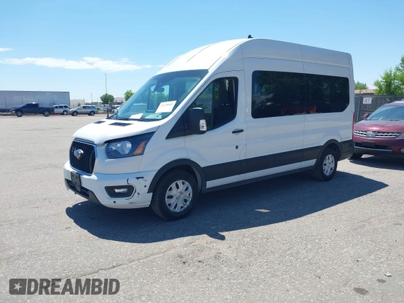 2024 Ford Transit Passenger XL with VIN 1FBAX2X88RKA16346, listed as a IAAI auction lot 42478903 with 21,423 mi miles and . Bid and sale history available at DreamBid. Image 2.
