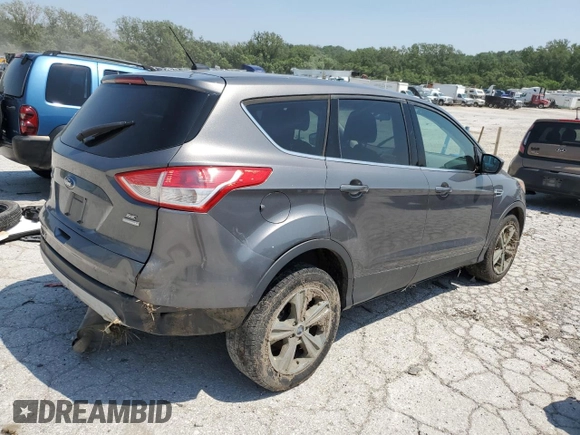 2013 Ford Escape SE with VIN 1FMCU9GX7DUA54057, listed as a Copart auction lot 60040545 with 173,086 mi miles and Salvage title. Bid and sale history available at DreamBid. Image 3.