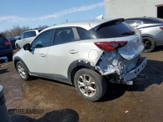 2017 Mazda CX-3 Touring with VIN JM1DKFC76H0176120, listed as a Copart auction lot 47482735 with 119,621 mi miles and Salvage Title. Bid and sale history available at carsss.com. Image 2.