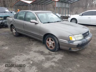 1998 Toyota Avalon XL with VIN 4T1BF18B7WU256930, listed as a IAAI auction lot 41297552 with 210,745 mi miles and . Bid and sale history available at DreamBid. Image 1.