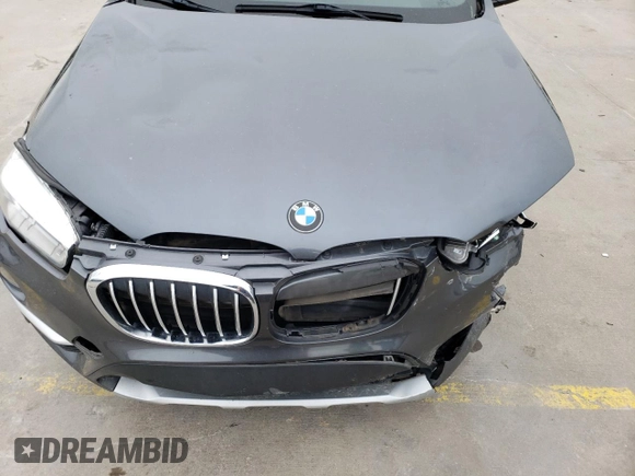 2017 BMW X1 sDrive28i with VIN WBXHU7C35H5H35194, listed as a Copart auction lot 47400983 with 80,312 mi miles and . Bid and sale history available at DreamBid. Image 12.