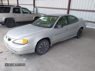 2001 Pontiac Grand Am SE with VIN 1G2NE52T81M648017, listed as a IAAI auction lot 42354372 with 206,086 mi miles and . Bid and sale history available at DreamBid. Image 2.