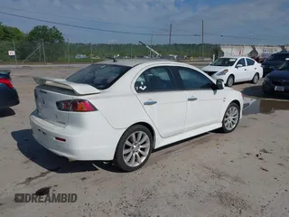 2011 Mitsubishi Lancer GTS with VIN JA32U8FW8BU030591, listed as a IAAI auction lot 42226736 with 110,010 mi miles and . Bid and sale history available at carsss.com. Image 4.
