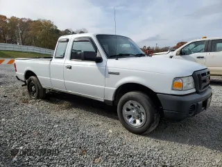 2010 Ford Ranger with VIN 1FTLR1EE1APA37032, listed as a Copart auction lot 82587614 with 215,440 mi miles and Salvage Title. Bid and sale history available at DreamBid. Image 4.