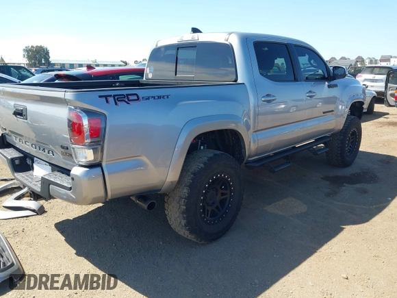 2021 Toyota Tacoma SR5 with VIN 3TMAZ5CN5MM156116, listed as a IAAI auction lot 42017208 with 34,410 mi miles and . Bid and sale history available at DreamBid. Image 4.
