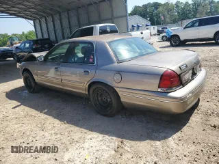 2003 Ford Crown Victoria LX z VIN 2FAFP74W33X141881, wystawiony jako Copart lot #54204695 z przebiegiem 98 466 mil mil oraz Szkoda całkowita • Salvage title. Historia ofert i sprzedaży dostępna na DreamBid. Obrazek 2.