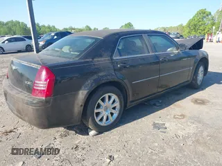 2006 Chrysler 300 C SRT8 with VIN 2C3KA73W16H399430, listed as a IAAI auction lot 41748693 with 1 mi miles. Bid and sale history available at carsss.com. Image 4.