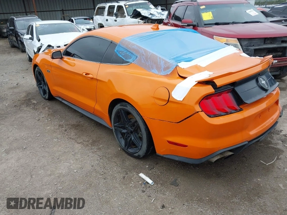 2021 Ford Mustang EcoBoost with VIN 1FA6P8TD5M5151336, listed as a IAAI auction lot 41916198 with 58,990 mi miles and . Bid and sale history available at DreamBid. Image 3.