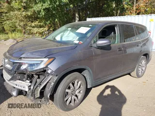 2020 Honda Pilot EX-L z VIN 5FNYF6H53LB069677, wystawiony jako IAAI lot #40581586 z przebiegiem 21 717 mil mil oraz . Historia ofert i sprzedaży dostępna na DreamBid. Obrazek 18.