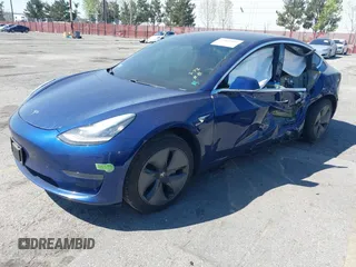 2020 Tesla Model 3 Standard Range Plus with VIN 5YJ3E1EA1LF590396, listed as a IAAI auction lot 41868089 with 51,278 mi miles. Bid and sale history available at carsss.com. Image 19.
