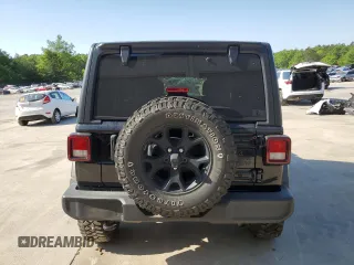 2021 Jeep Wrangler Unlimited Willys with VIN 1C4HJXDG4MW529583, listed as a Copart auction lot 53329625 with 119,697 mi miles and Salvage title. Bid and sale history available at DreamBid. Image 6.