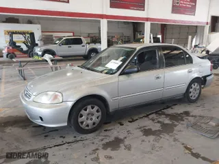 2000 Honda Civic VP with VIN 2HGEJ6614YH524394, listed as a IAAI auction lot 41709806 with 205,197 mi miles. Bid and sale history available at carsss.com. Image 2.