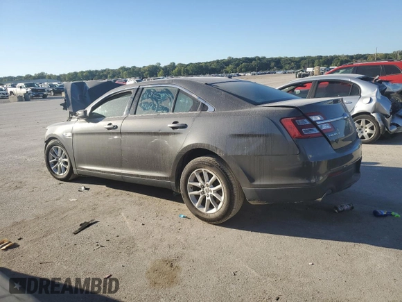 2015 Ford Taurus SE with VIN 1FAHP2D80FG116704, listed as a Copart auction lot 73571034 with 85,665 mi miles and Salvage Title. Bid and sale history available at DreamBid. Image 2.
