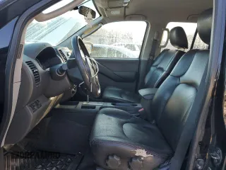 2010 Nissan Frontier LE with VIN 1N6AD0EV1AC407478, listed as a Copart auction lot 82302504 with 146,560 mi miles and Salvage title. Bid and sale history available at DreamBid. Image 7.