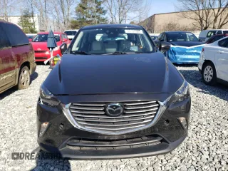 2016 Mazda CX-3 Grand Touring z VIN JM1DKBD7XG0107274, wystawiony jako Copart lot #52137385 z przebiegiem 35 376 mil mil oraz Szkoda całkowita • Salvage title. Historia ofert i sprzedaży dostępna na DreamBid. Obrazek 5.