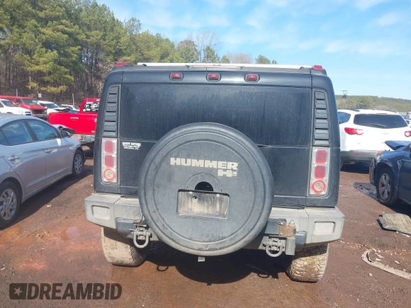 2003 Hummer H2 with VIN 5GRGN23U33H144379, listed as a IAAI auction lot 41452982 with 227,746 mi miles. Bid and sale history available at carsss.com. Image 16.