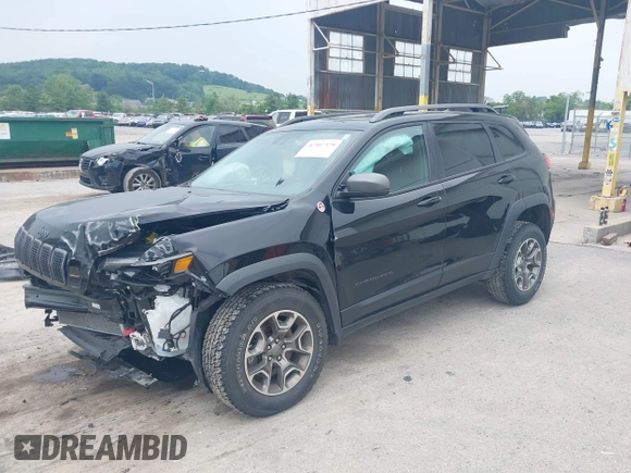 2021 Jeep Cherokee Trailhawk with VIN 1C4PJMBX0MD167941, listed as a IAAI auction lot 42507379 with 70,414 mi miles and . Bid and sale history available at DreamBid. Image 18.