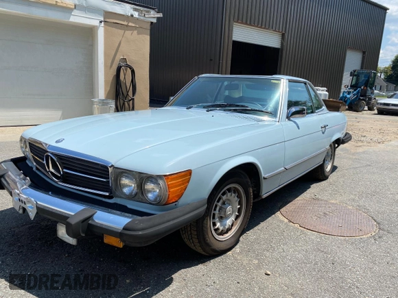 1975 Mercedes-Benz SL with VIN 10704412027415, listed as a Copart auction lot 82576724 with 105,242 mi miles and Clean title. Bid and sale history available at DreamBid. Image 2.