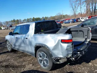 2022 Rivian R1T Adventure Package with VIN 7FCTGAAA1NN012328, listed as a IAAI auction lot 41307929 with 13,588 mi miles. Bid and sale history available at carsss.com. Image 14.