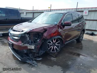 2019 Honda Pilot Touring 8-Passenger with VIN 5FNYF5H95KB009122, listed as a IAAI auction lot 41573338 with 85,845 mi miles. Bid and sale history available at carsss.com. Image 2.