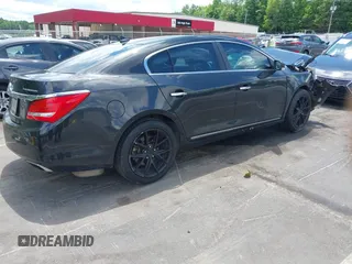 2014 Buick LaCrosse Premium I with VIN 1G4GD5G30EF305496, listed as a IAAI auction lot 42270646 with 210,038 mi miles and . Bid and sale history available at DreamBid. Image 4.