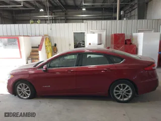 2019 Ford Fusion Hybrid SE with VIN 3FA6P0LUXKR205712, listed as a IAAI auction lot 41267049 with 124,687 mi miles. Bid and sale history available at carsss.com. Image 14.