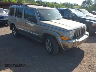 2006 Jeep Commander z VIN 1J8HH48N76C293897, wystawiony jako IAAI lot #42021253 z przebiegiem 214 412 mil mil oraz . Historia ofert i sprzedaży dostępna na DreamBid. Obrazek 1.