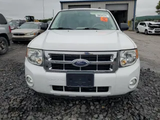 2008 Ford Escape XLT с VIN 1FMCU93118KC45606, выставлен на аукционе Copart как лот 58634705 с пробегом 122 209 миль миль и Списание • Salvage title. История ставок и продаж доступна на DreamBid. Изображение 5.