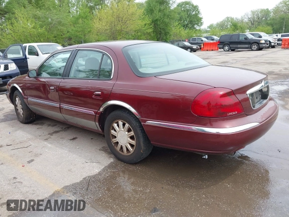 2000 Lincoln Continental with VIN 1LNHM97V5YY845447, listed as a IAAI auction lot 42077417 with 83,655 mi miles. Bid and sale history available at carsss.com. Image 3.