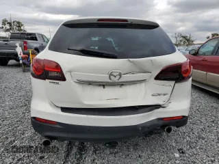 2013 Mazda CX-9 Grand Touring z VIN JM3TB2DA2D0411404, wystawiony jako Copart lot #52274675 z przebiegiem 109 476 mil mil oraz Szkoda całkowita • Salvage title. Historia ofert i sprzedaży dostępna na DreamBid. Obrazek 6.