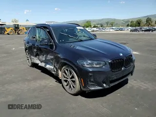 2023 BMW X3 M40i with VIN 5UX83DP0XP9P56592, listed as a Copart auction lot 52014325 with Not Provided miles and Salvage Title. Bid and sale history available at DreamBid. Image 12.
