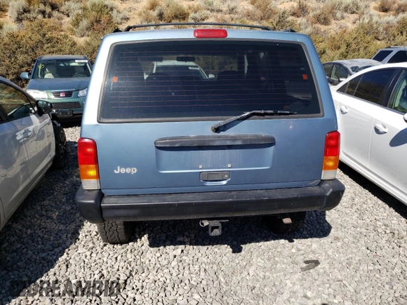 1997 Jeep Cherokee SE with VIN 1J4FJ28S4VL544977, listed as a Copart auction lot 70059214 with 271,174 mi miles and Salvage Title. Bid and sale history available at carsss.com. Image 6.