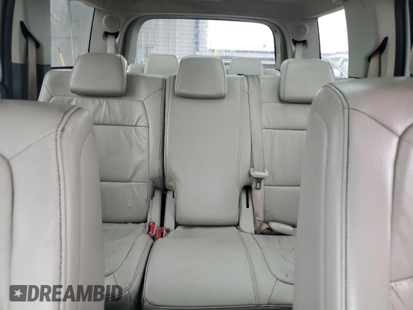 2009 Ford Flex SEL z VIN 2FMDK52CX9BA09974, wystawiony jako Copart lot #57184765 z przebiegiem 184 769 mil mil oraz Szkoda całkowita • Salvage title. Historia ofert i sprzedaży dostępna na DreamBid. Obrazek 10.