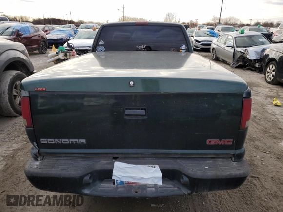 2001 GMC Sonoma SLS 1SG z VIN 1GTCS19W318247147, wystawiony jako Copart lot #83135464 z przebiegiem 292 056 mil mil oraz Szkody całkowita. Historia ofert i sprzedaży dostępna na DreamBid. Obrazek 6.